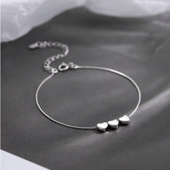 Mojoyce- Silver Heartstrings Bracelet