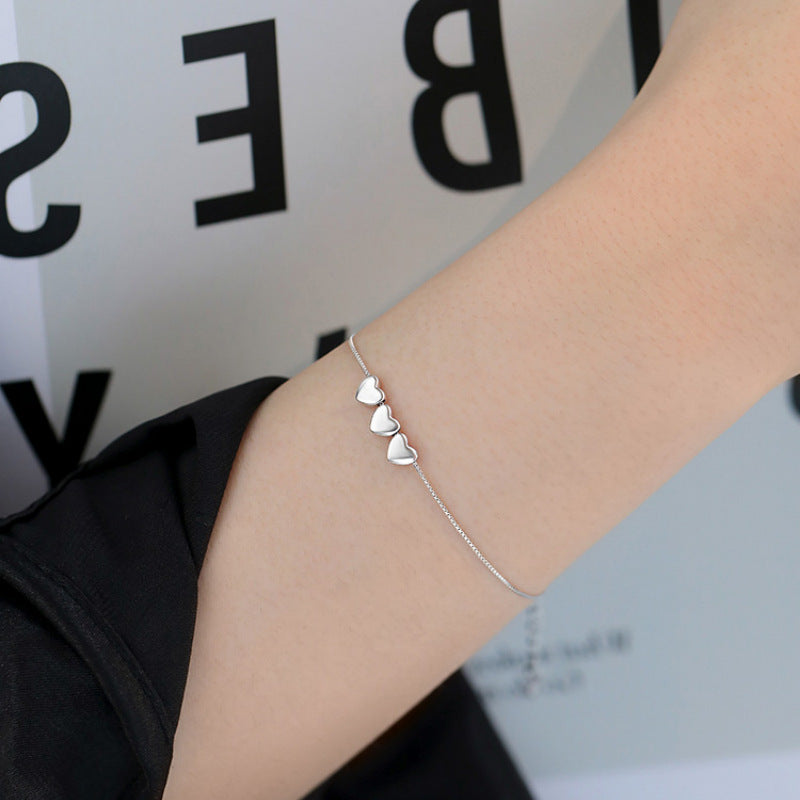 Mojoyce- Silver Heartstrings Bracelet