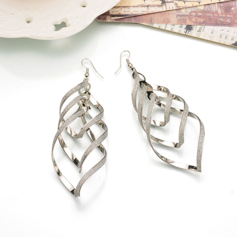 Mojoyce- OL spiral earrings