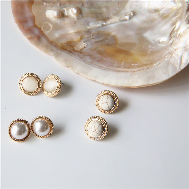 Mojoyce- Pearl Cat Eye Stud Earrings