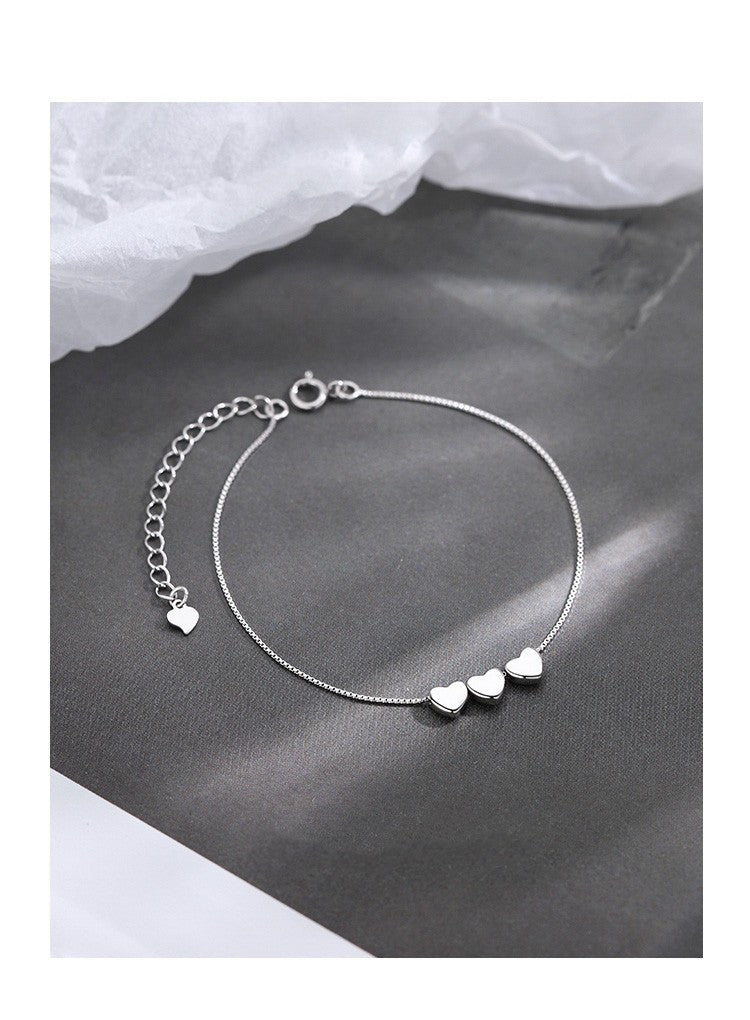 Mojoyce- Silver Heartstrings Bracelet