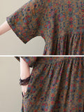Mojoyce-Vacation Loose Half Sleeves Floral Printed Pleated Round-Neck Midi Dresses